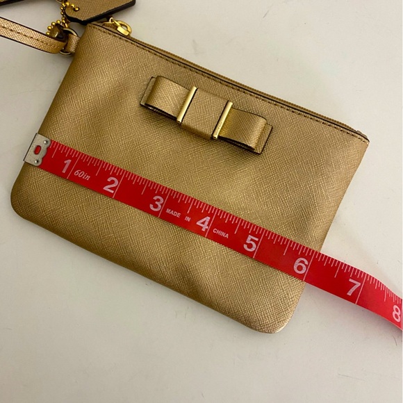 Coach Golden Bow Darcy Wristlet - Picture 5 of 7